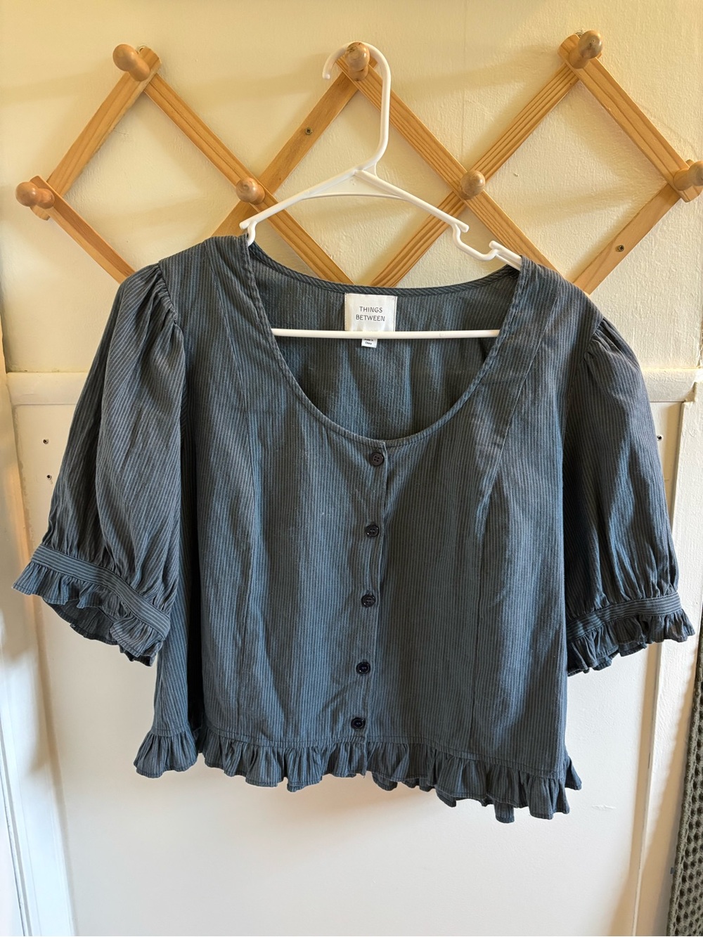 Things Between blue Ruffle Hem Button-Front Blouse